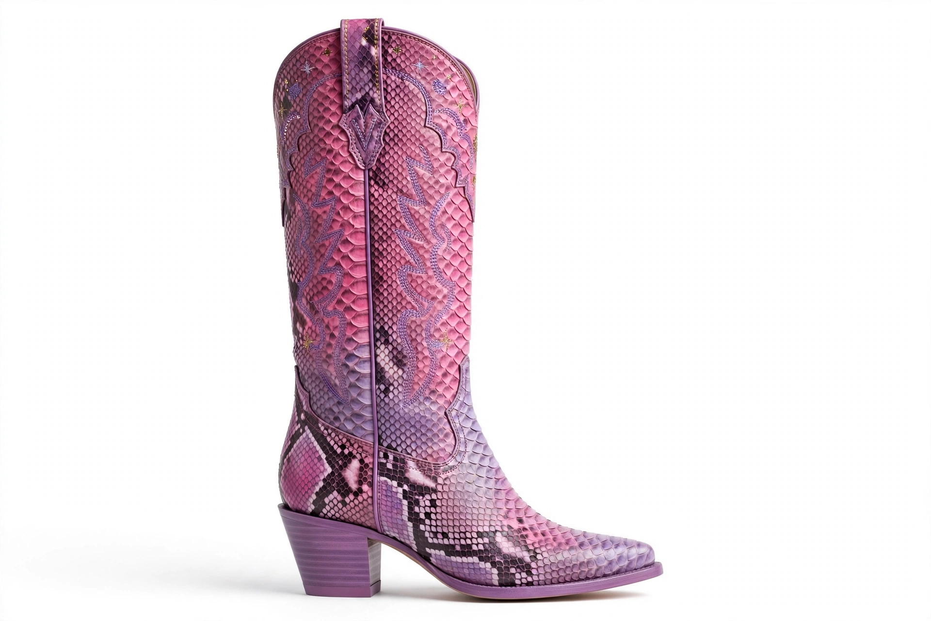 Starlet pink snakeskin cowboy boot on a white studio background